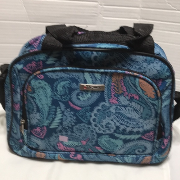 Tag shoulder bag with double straps and outside zip compartment. NWOT